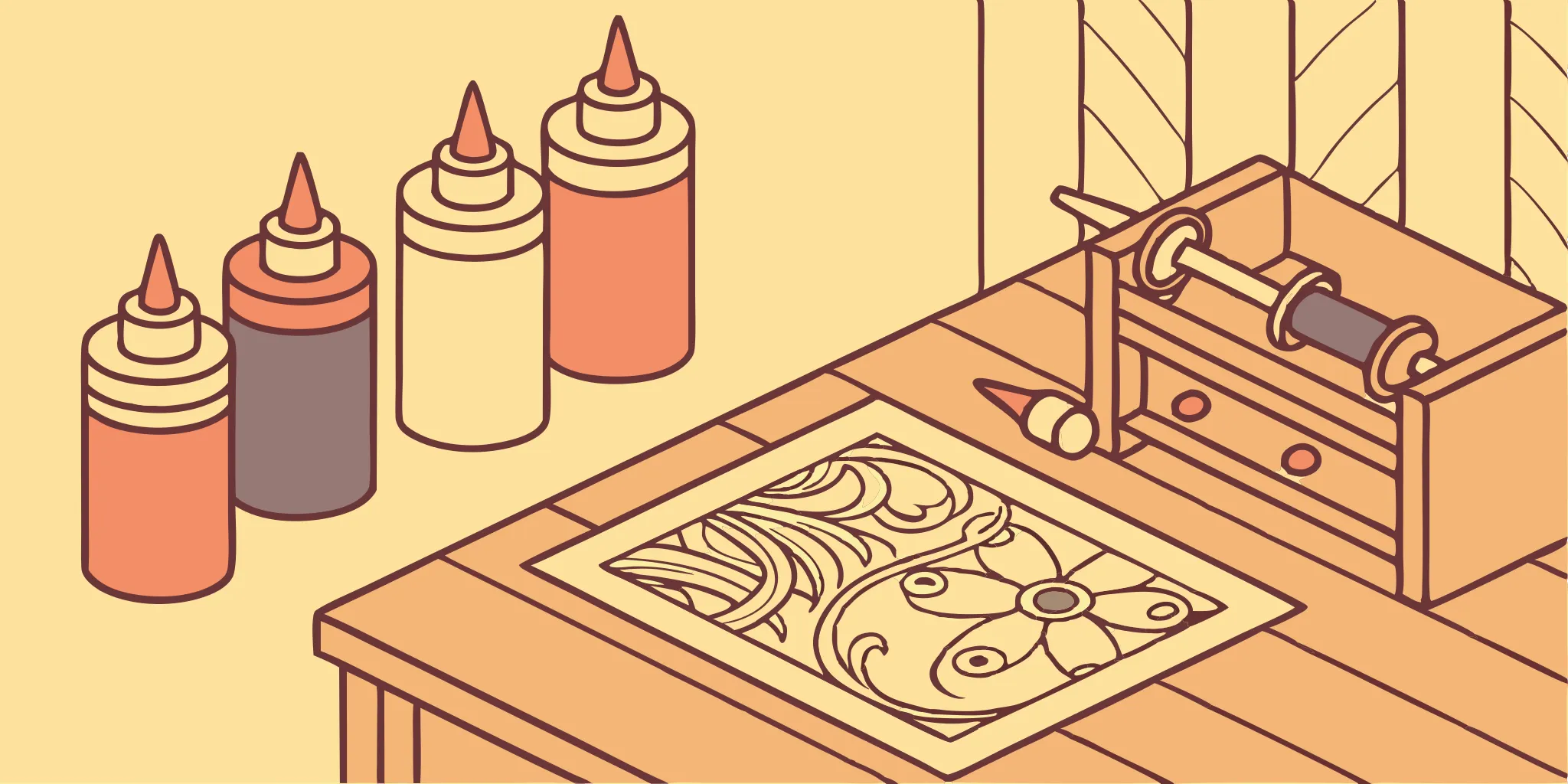 Tattoo artist's workbench with tools and design elements.