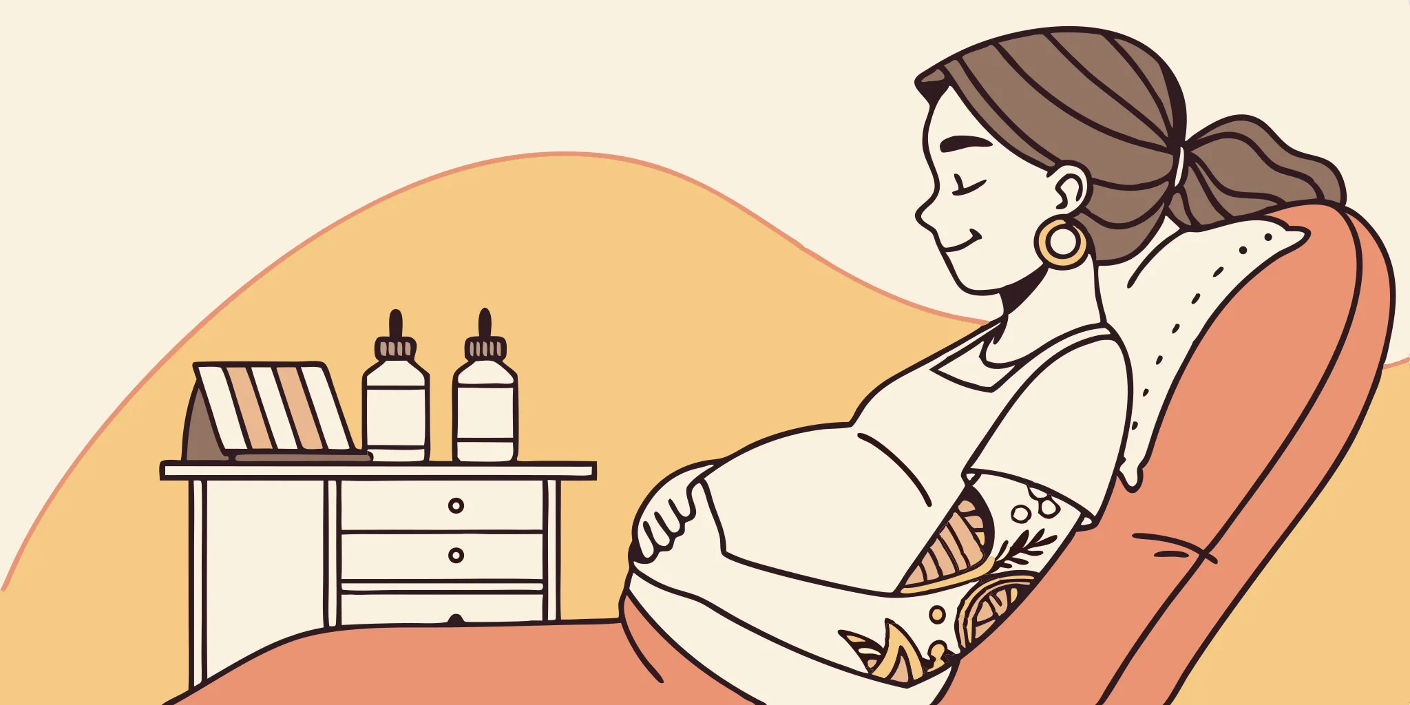 Pregnant belly with visible tattoos.
