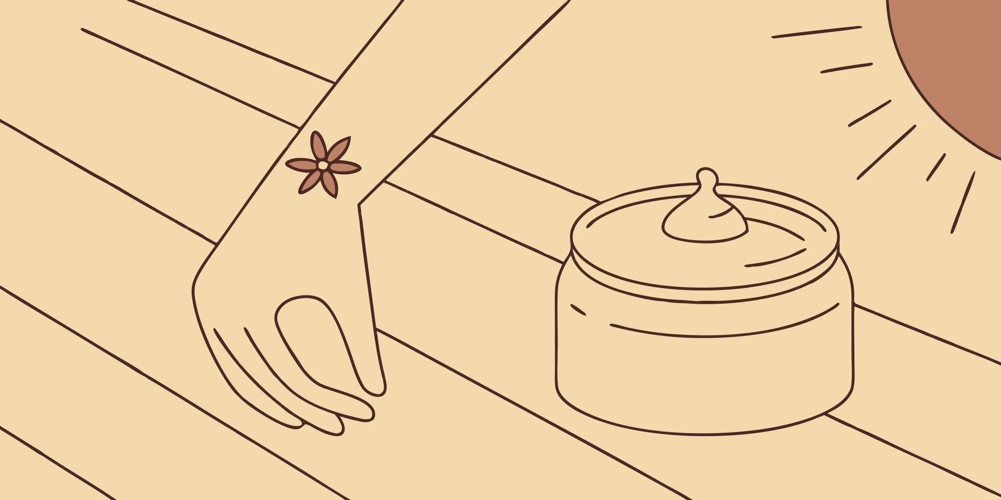 Tattoo removal cream near tattooed arm.