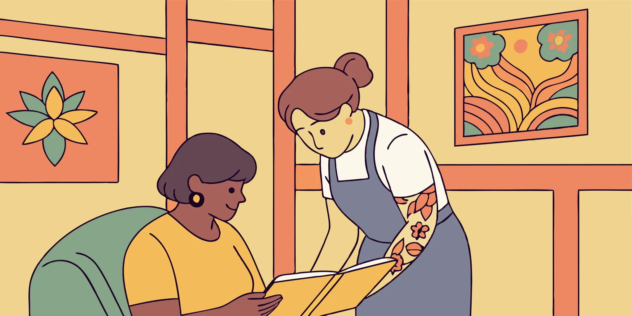 Book a Wild Heart Tattoo appointment. Floral sleeve tattoo artist consults client in bright studio.