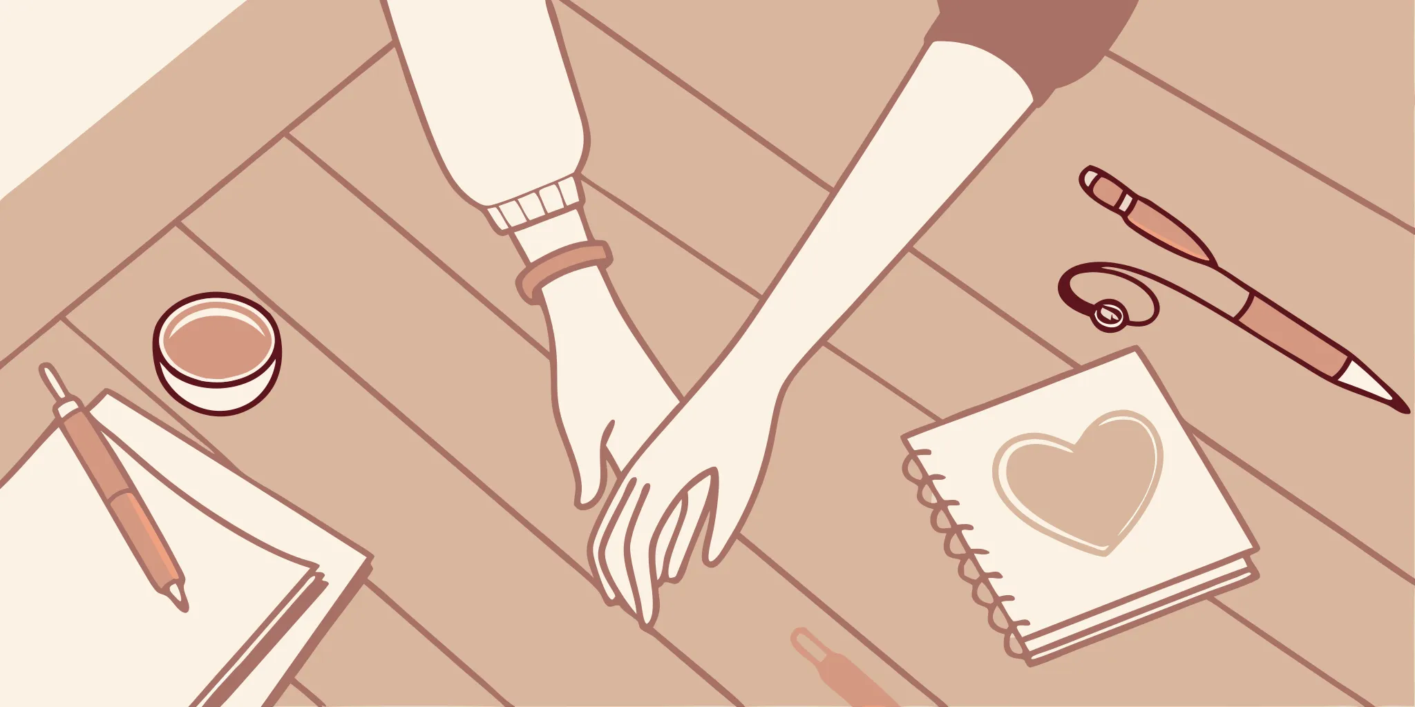 Couple's hands planning matching tattoo designs.